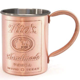 Tito's copper mug exterior highlights the warm finish and keeps cocktails cold longer.