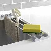 Tomorotec over-the-sink rack extended to fit tall bottles and brushes.