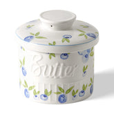 Toptier butter crock with water line on counter keeps spreadable butter nearby.