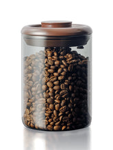 Tourdeus ground coffee glass container with airtight seal preserves aroma and flavor.
