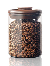 Tourdeus pop-top coffee bean jar keeps beans fresh with easy access.