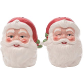 Transpac Dolomite Santa salt and pepper set on a festive table, adding color.