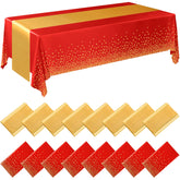 Tudomro red and gold disposable tablecloth covering a long banquet table.