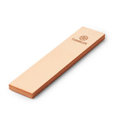 Tumbler leather strop cowhide close up showing premium material for precise edge refinement
