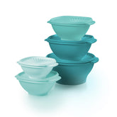 Tupperware Heritage bowls stacked in vintage green for space-saving storage.