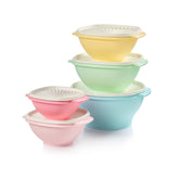 Tupperware Heritage Collection bowls with sunburst lids keep leftovers fresh.