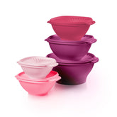 Tupperware Heritage Collection vintage pink sunburst lid bowls ready for everyday storage.