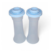 Tupperware large hourglass salt and pepper shakers in sheer ice blue with airtight seals.