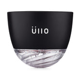 Ullo wine purifier on glass enabling a purer pour and richer aromas.