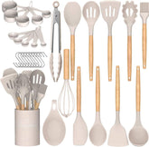 Umite Chef 33-piece utensil set on a sleek holder for tidy kitchen organization.