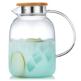 Unbreakable Glass Pitcher with handle and lid for sturdy pouring.