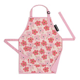 Urban Infant Little Helper apron with poppies pattern, ideal for baking and crafts.