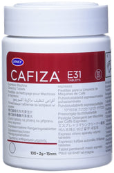Urnex Cafiza tablets in jar close-up showing cleaning power for espresso machines