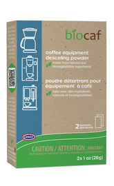 Urnex Full Circle descaling powder packet close-up for mineral removal in coffee machines