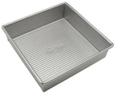 USA Pan square 8-inch cake pan top view highlighting even browning potential