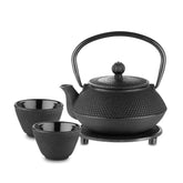 Velaze cast iron teapot pouring, delivering rich aroma.