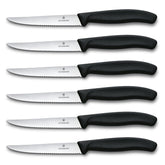 Victorinox Swiss Classic steak knife set with black handles for precise slicing.