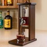 Vida Brillante whiskey decanter with tap displayed on a home bar for effortless pouring.