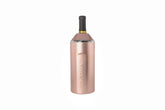 Vinglacé bottle chiller in rose gold keeps wine cold during outdoor gatherings.
