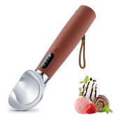 VRAIKO heated ice cream scoop front view with ergonomic grip and smooth scooping action.