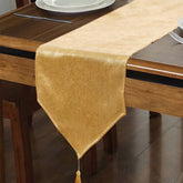 WAITER TREE faux linen table runner with tassels adds festive sparkle to holiday tables.