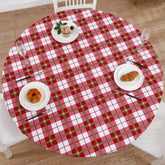 Walrus round vinyl tablecloth on a 57-66 inch table, protecting against spills with style.