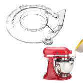 Wanyshapy pouring shield on tilt head mixer contains batter and flour for cleaner counters.