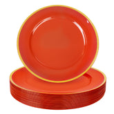 WDF 12-inch red and gold charger plate on table for an elegant dinner setting