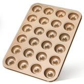 Webake mini donut pan with 24 cavities ready for quick batch bakes on the counter.