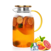 Wells ribbed glass pitcher with lid spout for smooth pour and control