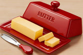 WERTIOO butter dish with lid on countertop keeps butter fresh and dust-free.
