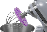 Whisk Wiper PRO tilt-head mixer wipe in action keeping bowls clean