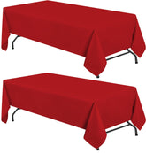 White Classic Wealuxe red tablecloth 60x102 on rectangular table for an elegant, stain-resistant setting.