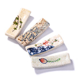 Whitenesser Japanese-style chopstick rest set on table keeps utensils organized.