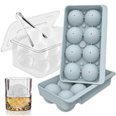 WIBIMEN large ice cube molds in blue produce eight round balls for whiskey.