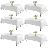 WIGENIUS 6-pack white tablecloth 60x102 inch on table for a sleek dining setup.