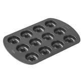 Wilton Mini Donut Pan outer view demonstrates sturdy steel and 12 cavities for quick batch baking.