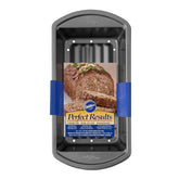Wilton Perfect Results meatloaf pan with drain tray reducing grease for leaner meals.