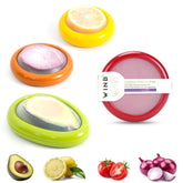 Winb avocado keeper with open lid shows easy access to halved fruit.