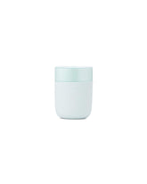 W&P Porter ceramic mug with mint silicone sleeve for a comfortable grip during hot drinks