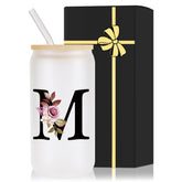 Wulcea monogrammed glass cup with bamboo lid and straw, ideal for personalized sipping.