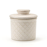 Xela ceramic butter crock with lid shows airtight seal for soft butter