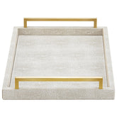 XIGEXIGE ivory shagreen tray on an ottoman, ideal for drinks and decor.