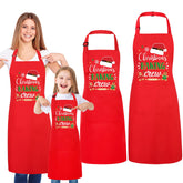 XLSXEXCL Christmas matching aprons family set displayed on counter for festive baking