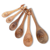 Xyembu 6-piece wooden measuring spoons set with engraved scales for precise dry measurements.