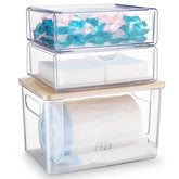 YAFFWA trash bag dispenser under sink with clear acrylic body and bamboo lid.