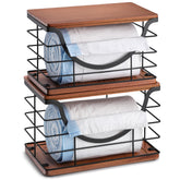 YAFFWA trash bag holder with bamboo top mounted on wall for easy access.