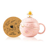 Yalucky Kawaii astronaut mug with pink finish and lid for convenient sipping.