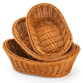 Yarlung brown woven bread basket with fresh loaves on a kitchen counter.