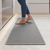 YDKGL non-slip rug in front of sink absorbs spills for safer footing.